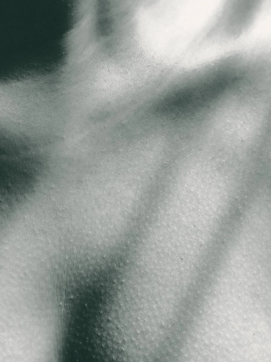 A woman doctor talking to a patient in a warm wooden room