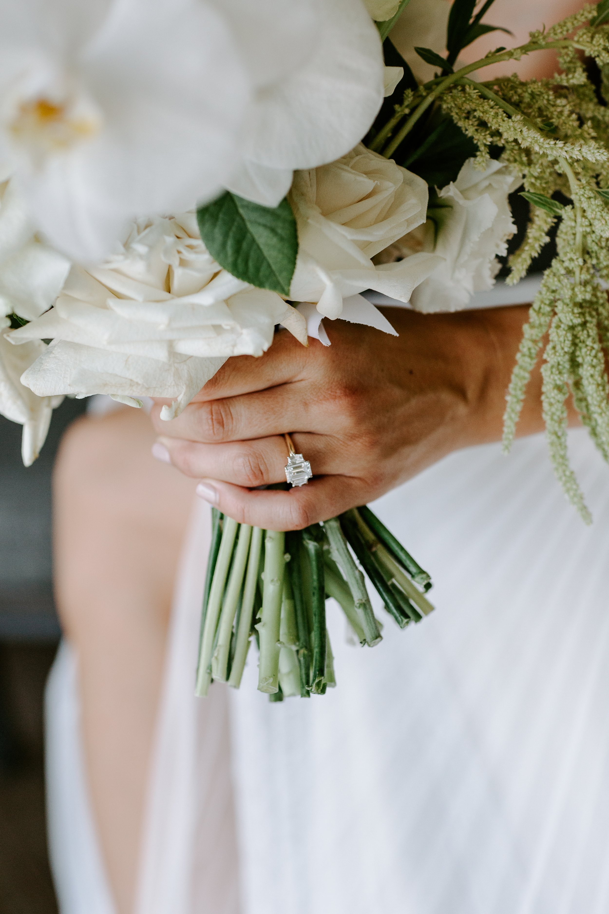 bridal bouquet and rings