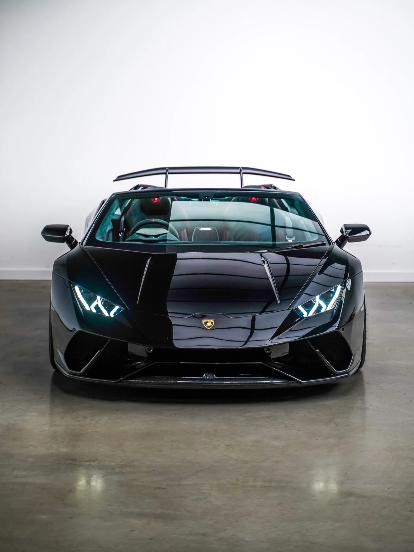 Here at the Vault Collection we are proud to offer this 2018 Lamborghini Huracan Performante Spyder finished in Nero Noctis. This vehicle is offered with just 17,650 miles covered and 3 owners from new. This car comes complete with full Lamborghini a