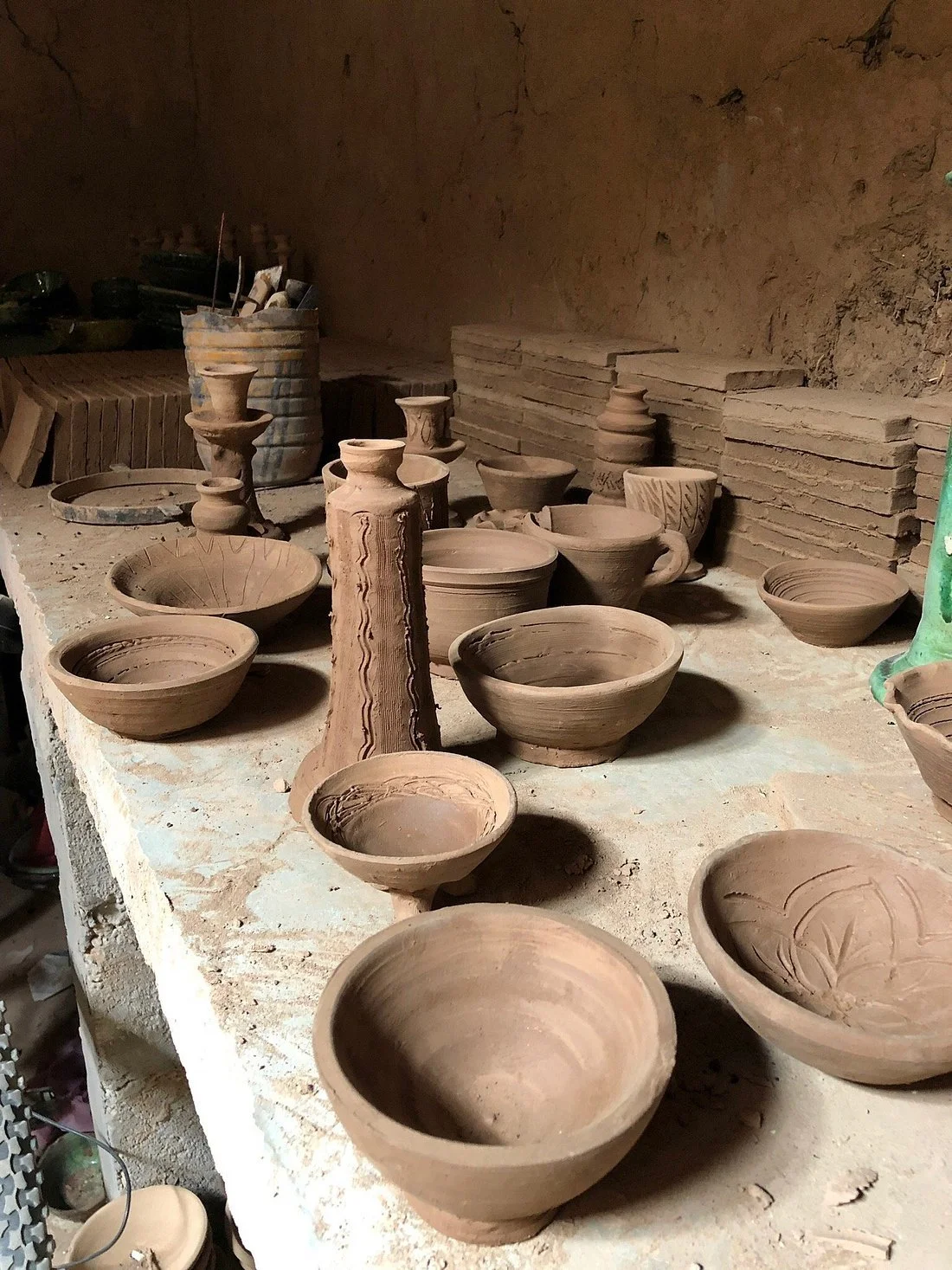 Tamegroute pottery before firing in the kiln.jpg