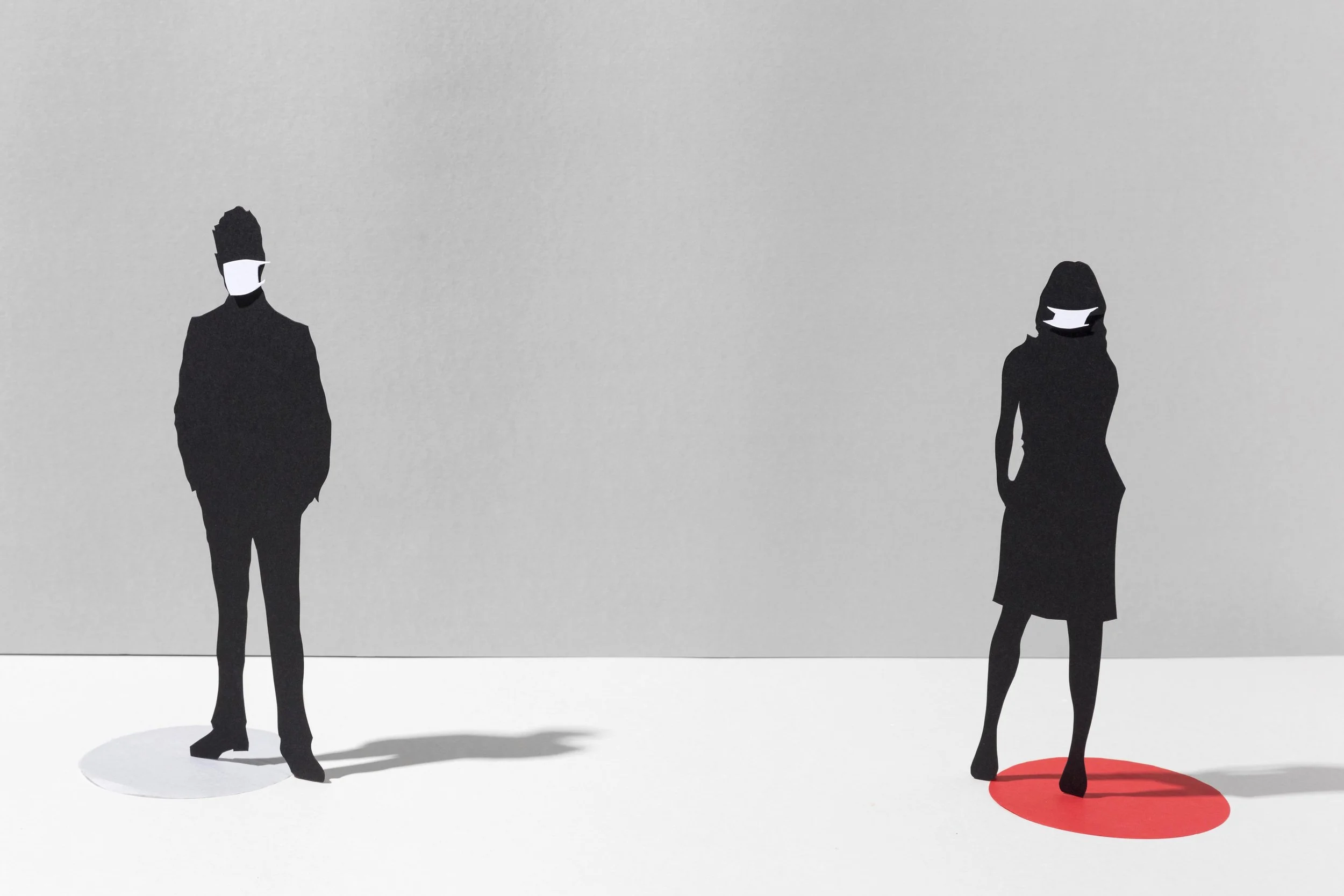 Faceless people standing