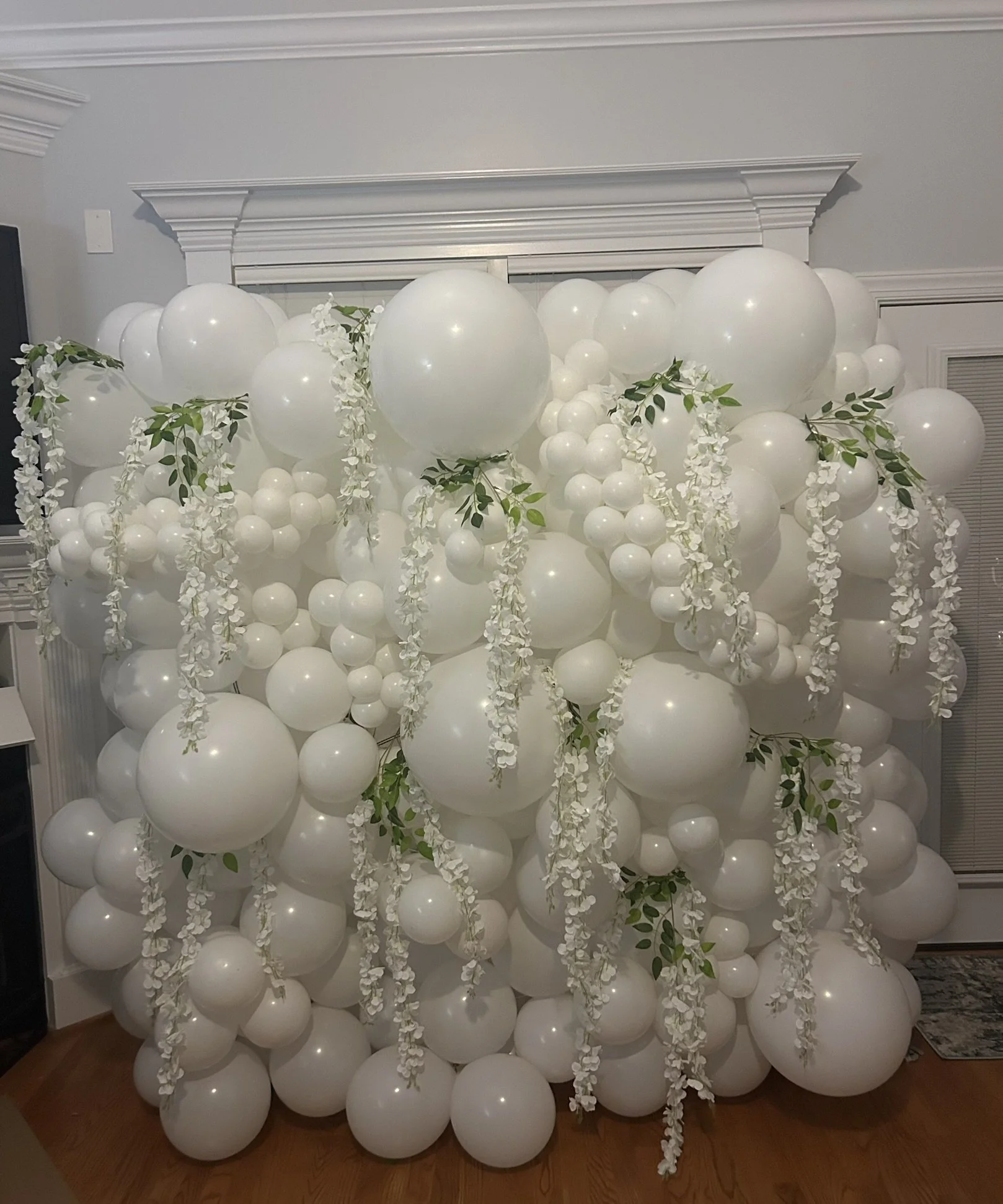 White Balloon Wall with Wisteria.JPEG
