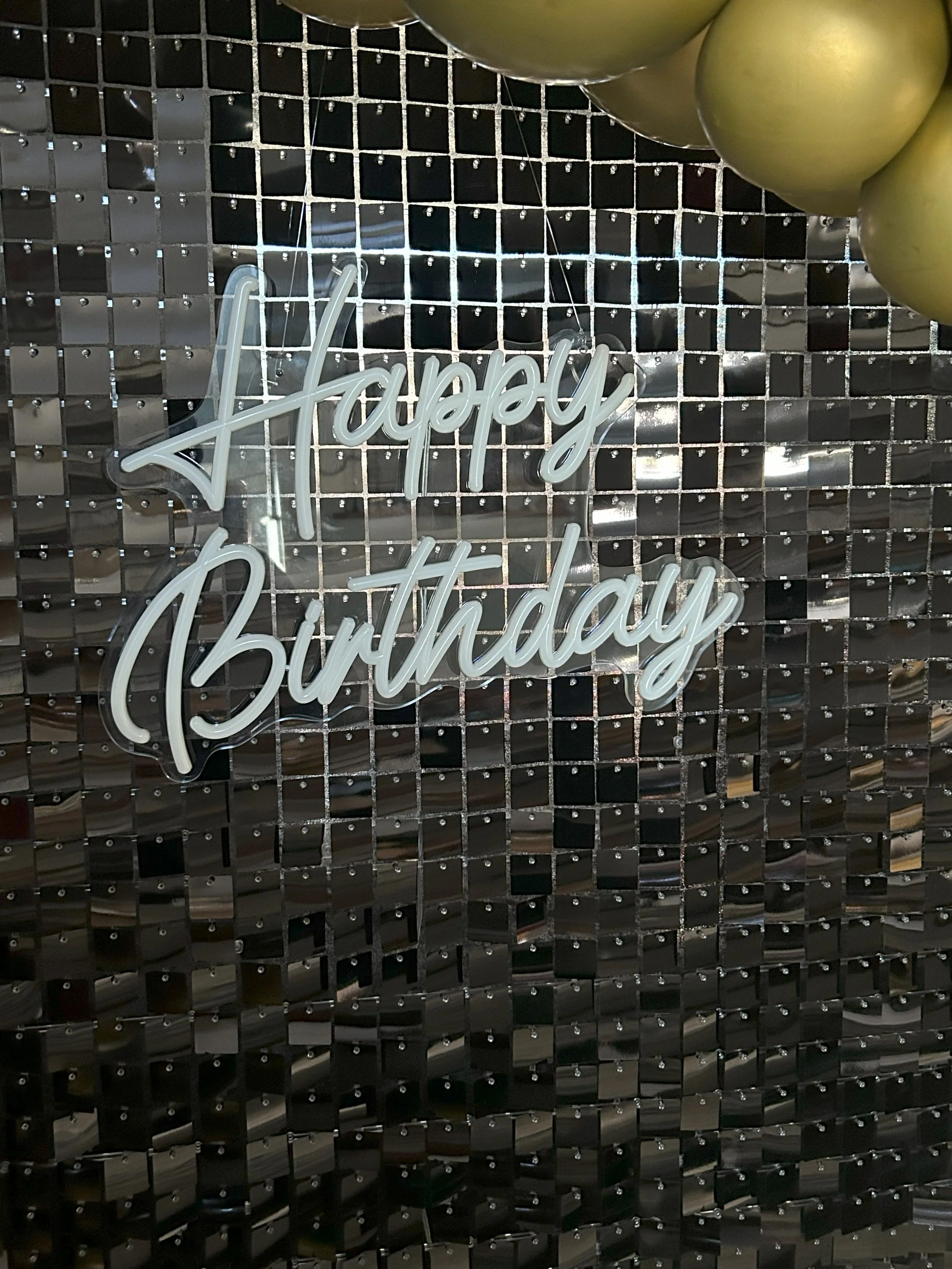 Neon HB Sign Shimmer Wall.jpg