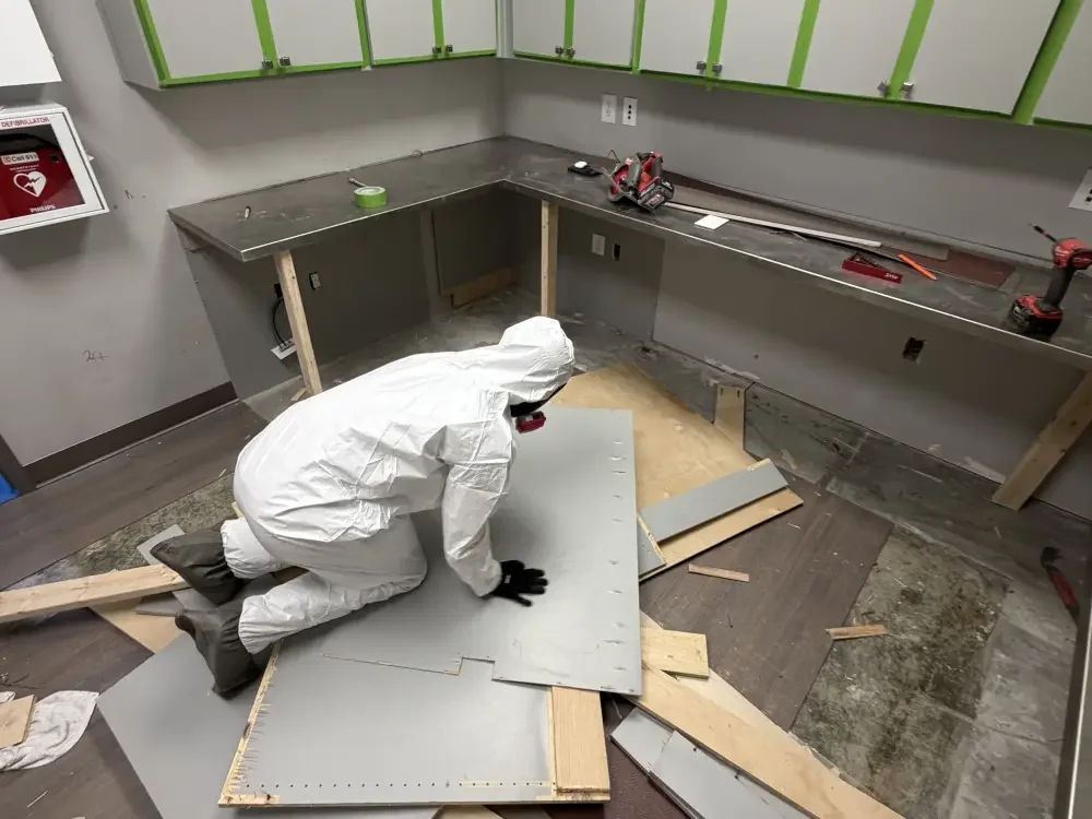 hazmat-suit-commercial-water-mold-mitigation.webp