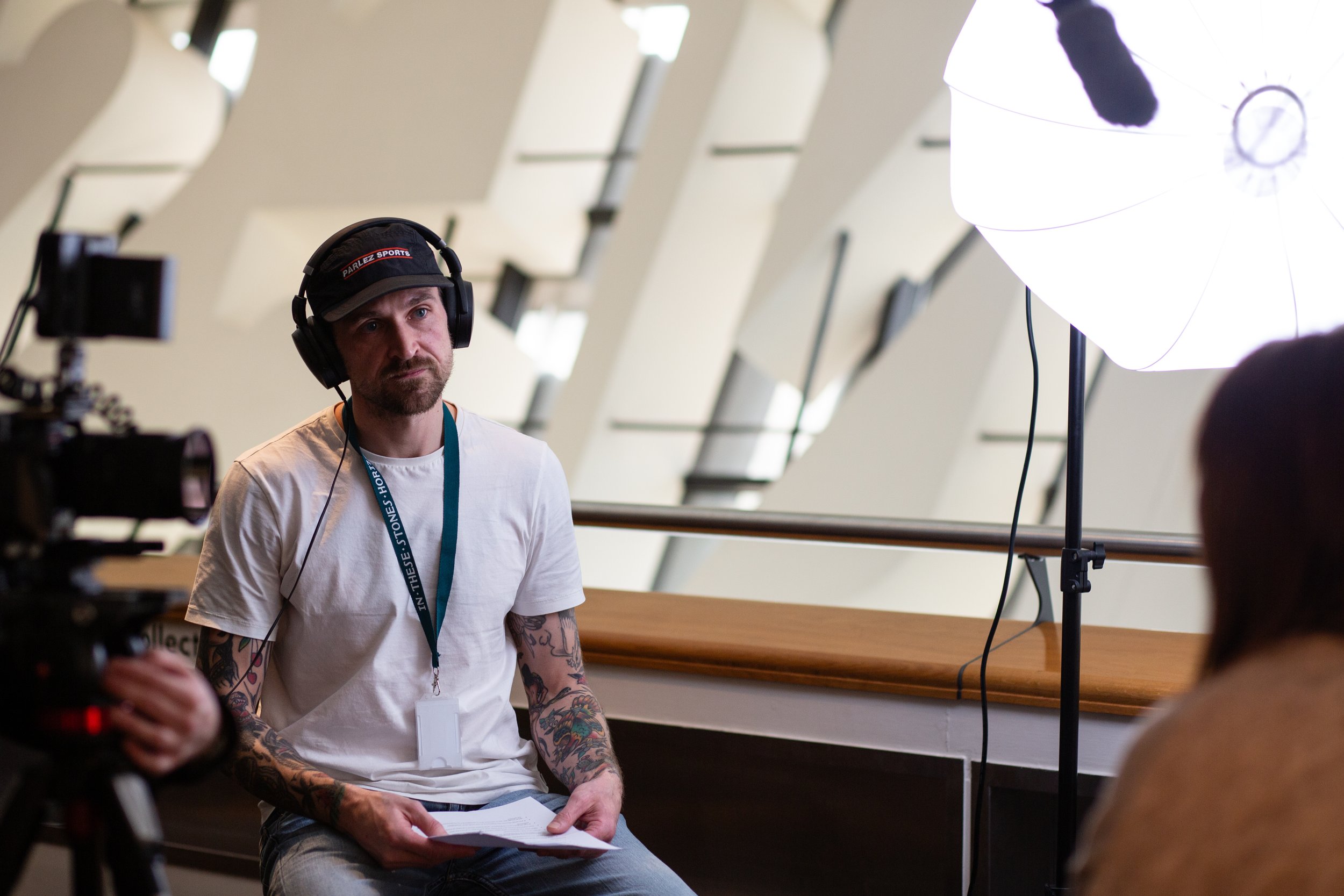 Man sat interviewing.jpg