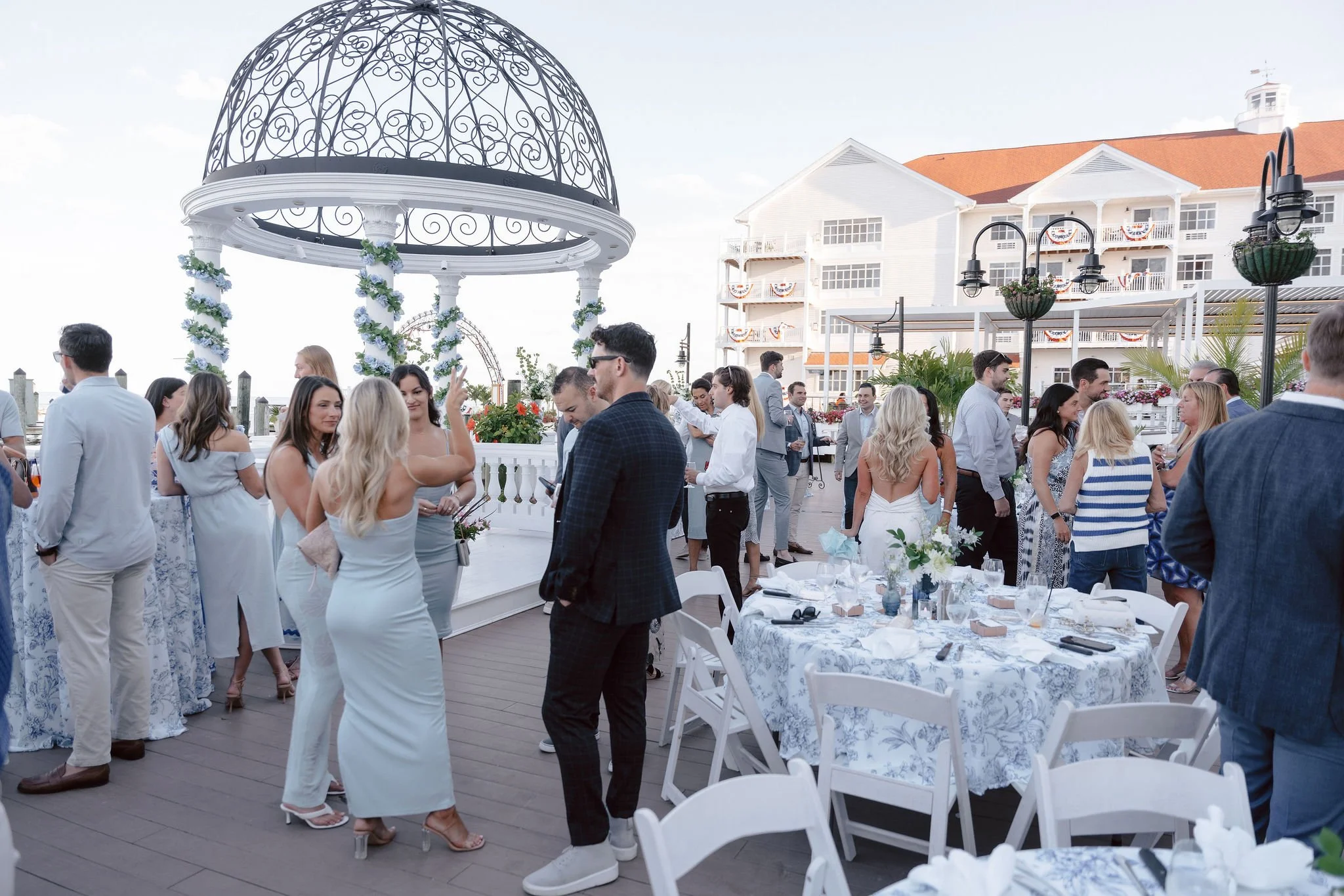 Rehearsal dinner at Wedding Dome with views of Rod 'N' Reel Resort. 
