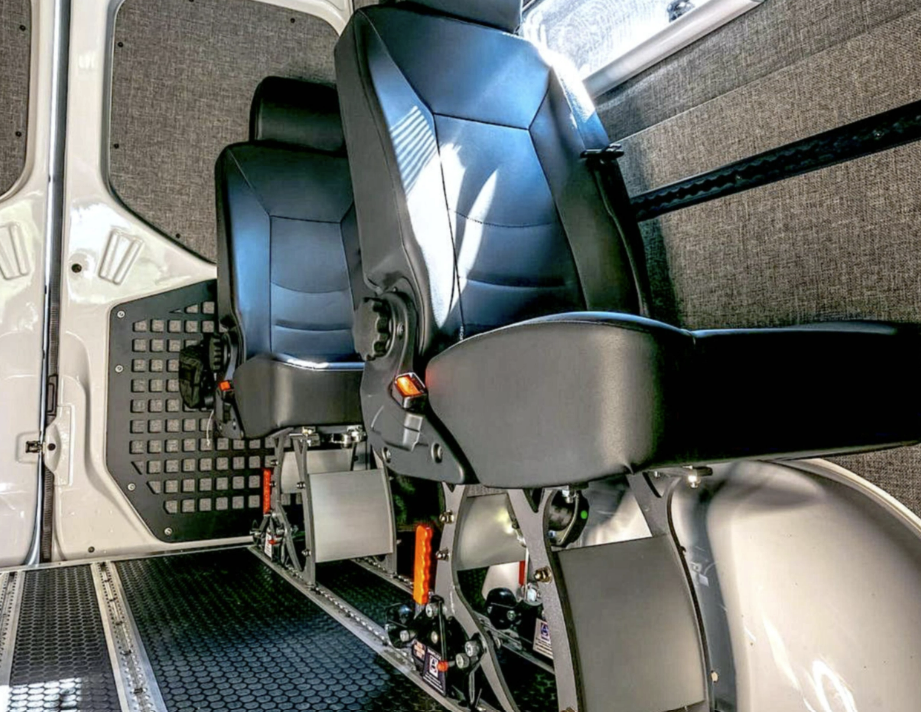 SmartFloor installation with Scheel-mann seats securely mounted to L-track