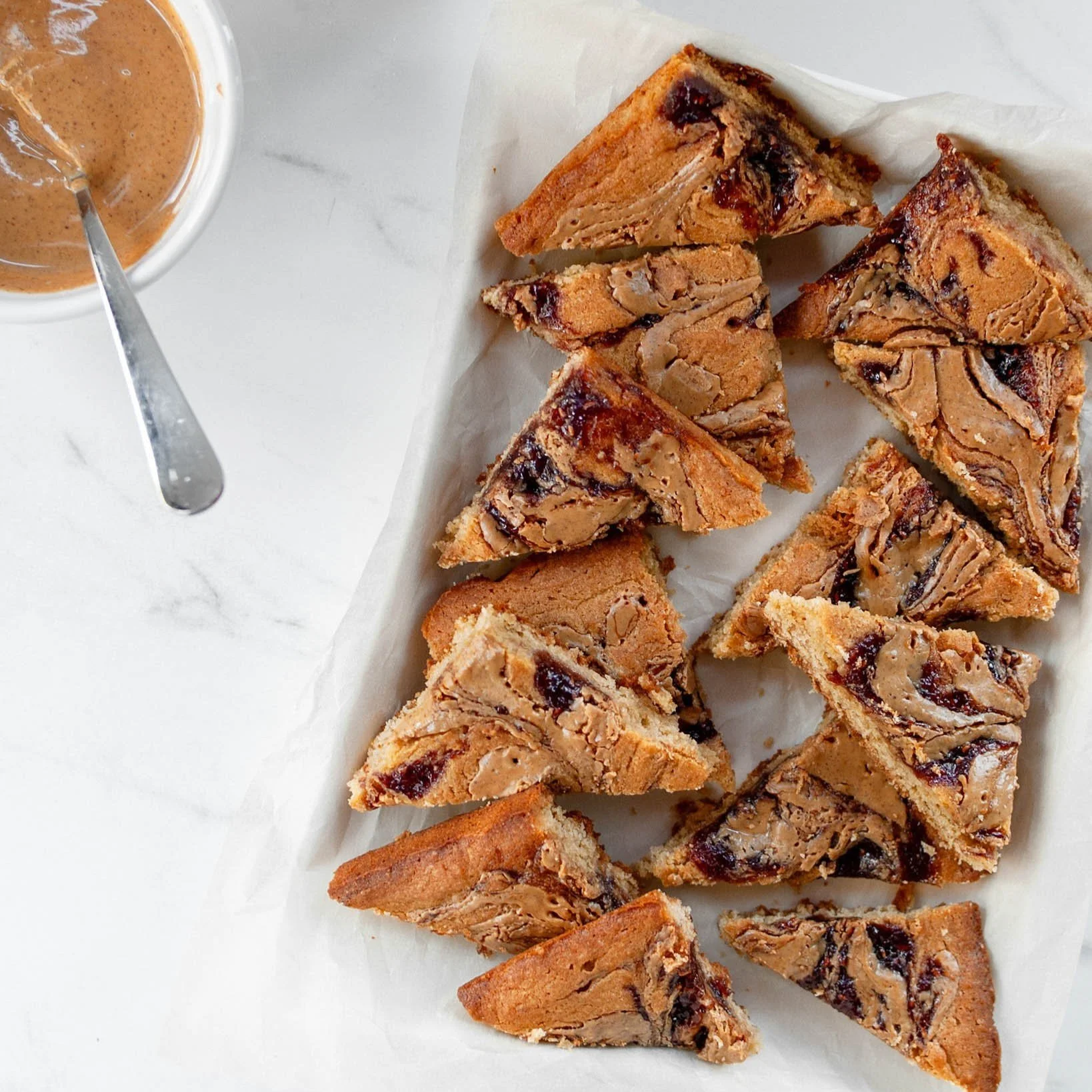 Peanut Butter &amp; Jelly Swirled Blondies
