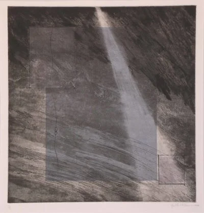 Photograph of a geometric drawing on a dark textured surface, featuring two overlapping squares and a rectangle, with a faint outline of a triangle.