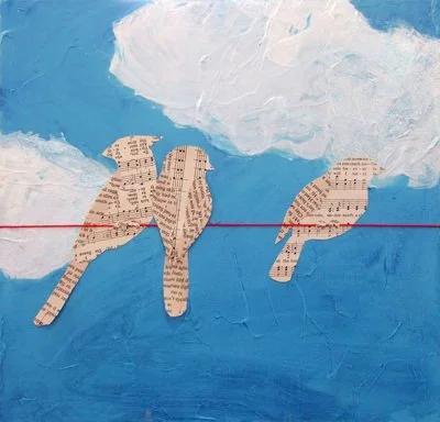 Artwork of two birds made from collage of text on a blue background with clouds, perched on a red wire