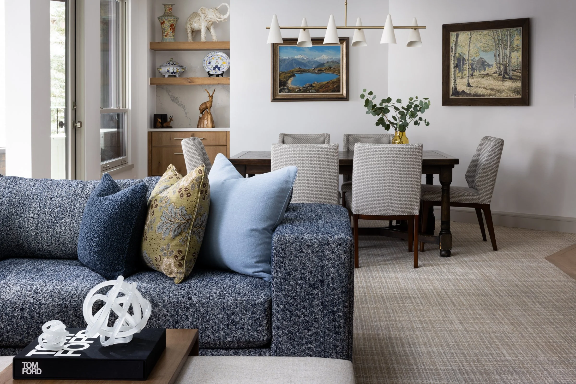 This project was designed for close friends in their family home that has been part of Vail since nearly its beginning - making it especially personal.  The new design honors their family matriarch through layering original elements into the new spac