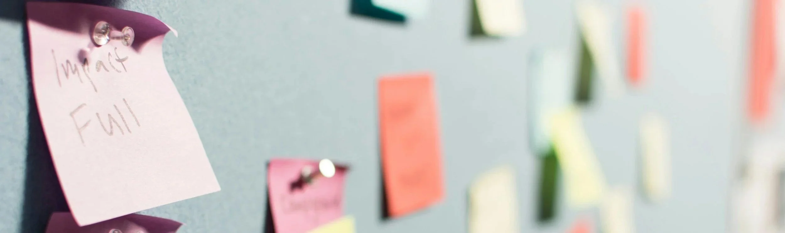 notes tacked to a board showing the different aspects of a video