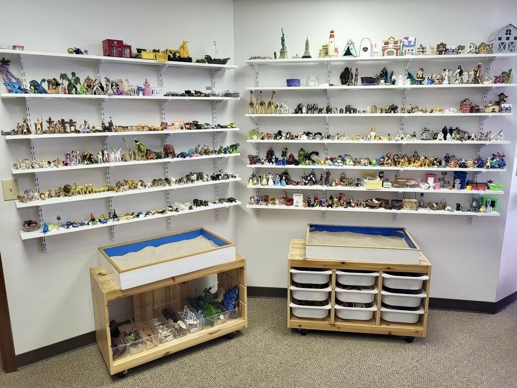 therapy office with toys and sensory items for play therapy