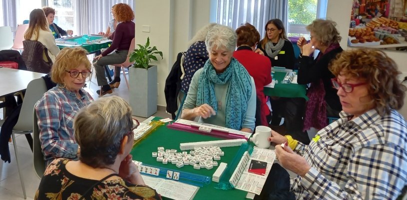 Beginners American Mahjong class, San Diego. Three tables of Mahjong players at a fundraising event