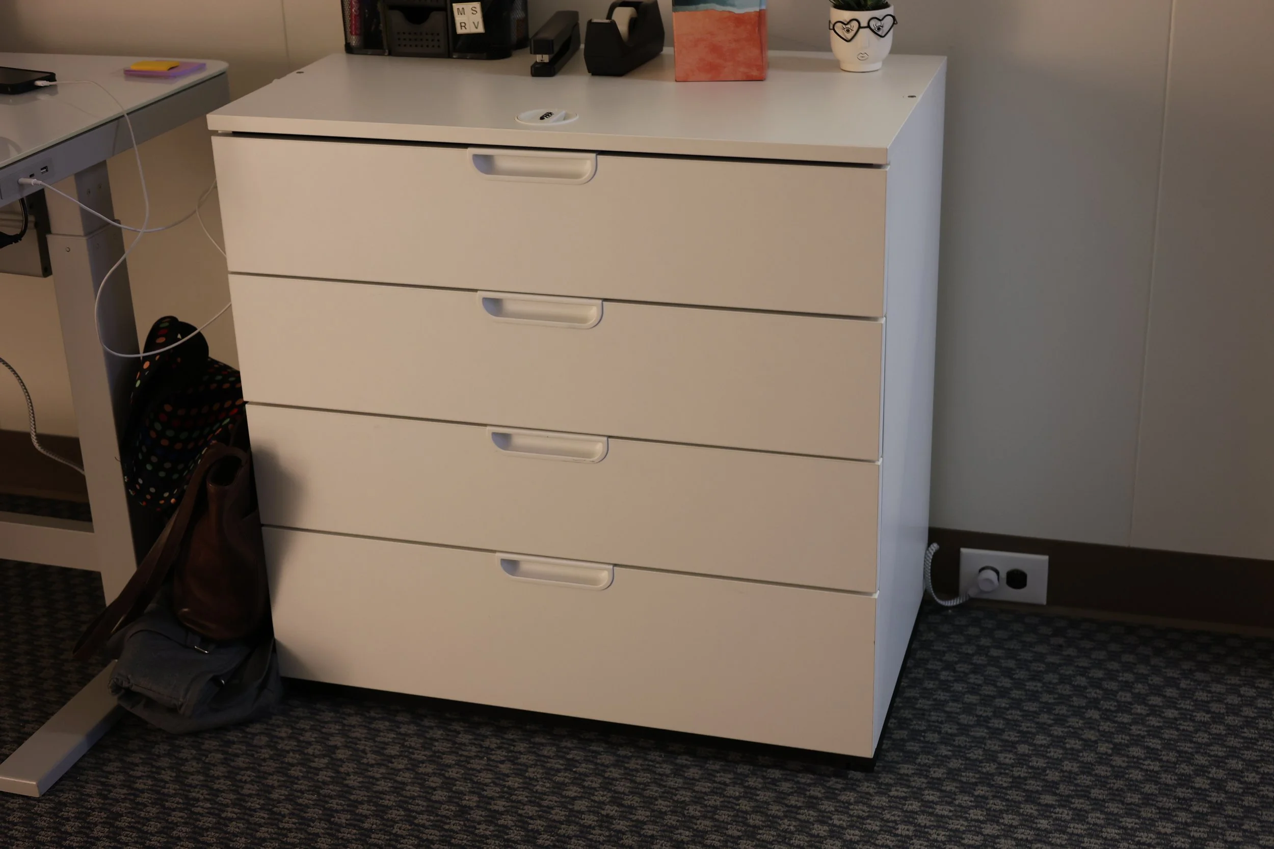 White File Cabinet with combination lock.