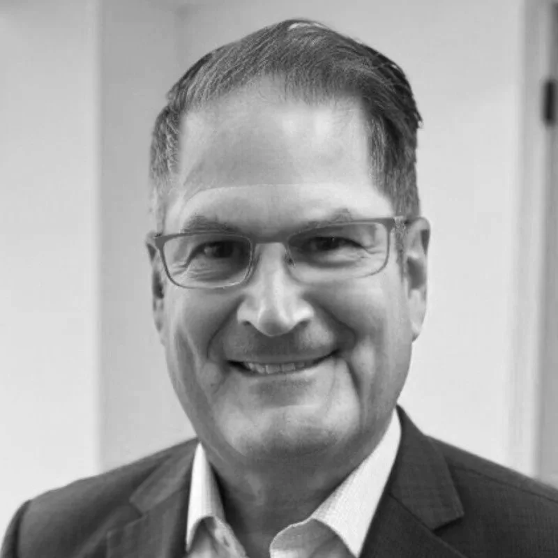 Gray background with white text saying 'Coming Soon' and a compass-like design with the word 'VANE' beneath it.