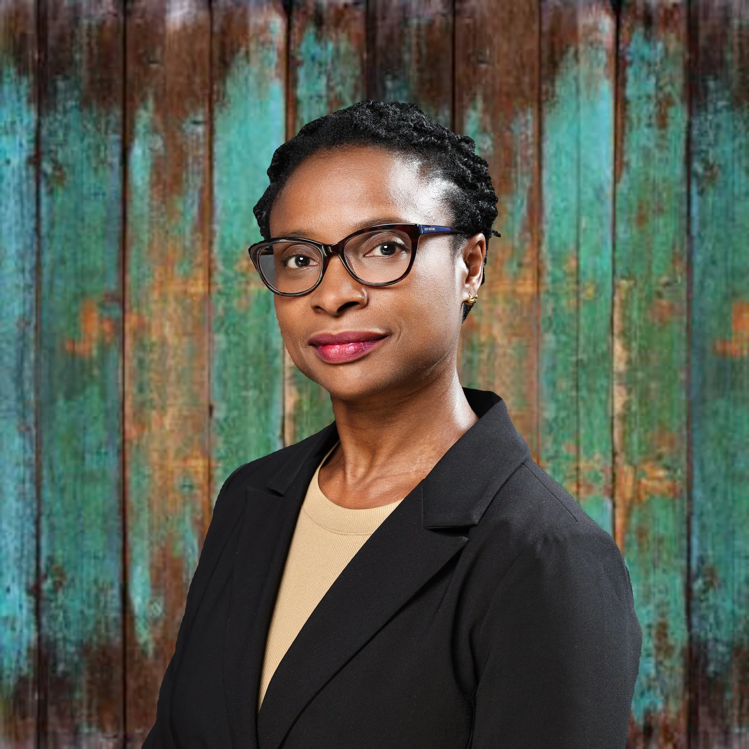 Picture of Kimion Walker CE sitting on stairs at the grace hopper conference with Hands on her chin.