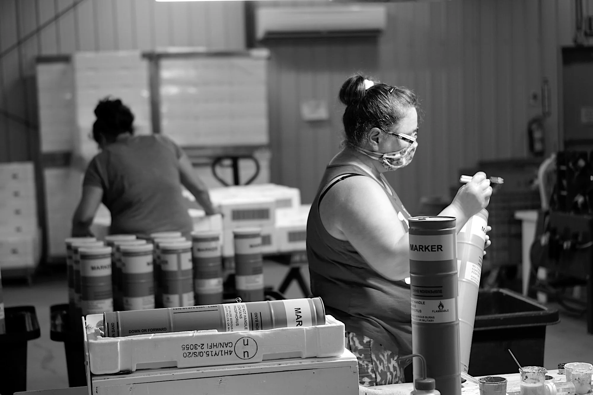 Working in an HFI Pyrotechnics factory, assembling pyrotechnic devices. HFI is a privately-owned manufacturer in the global defence and security industry.