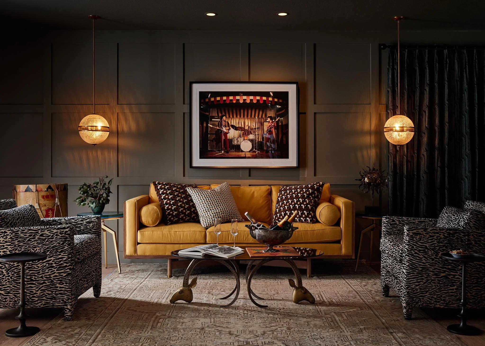 Stylish living room with yellow couch and zebra-patterned love seats