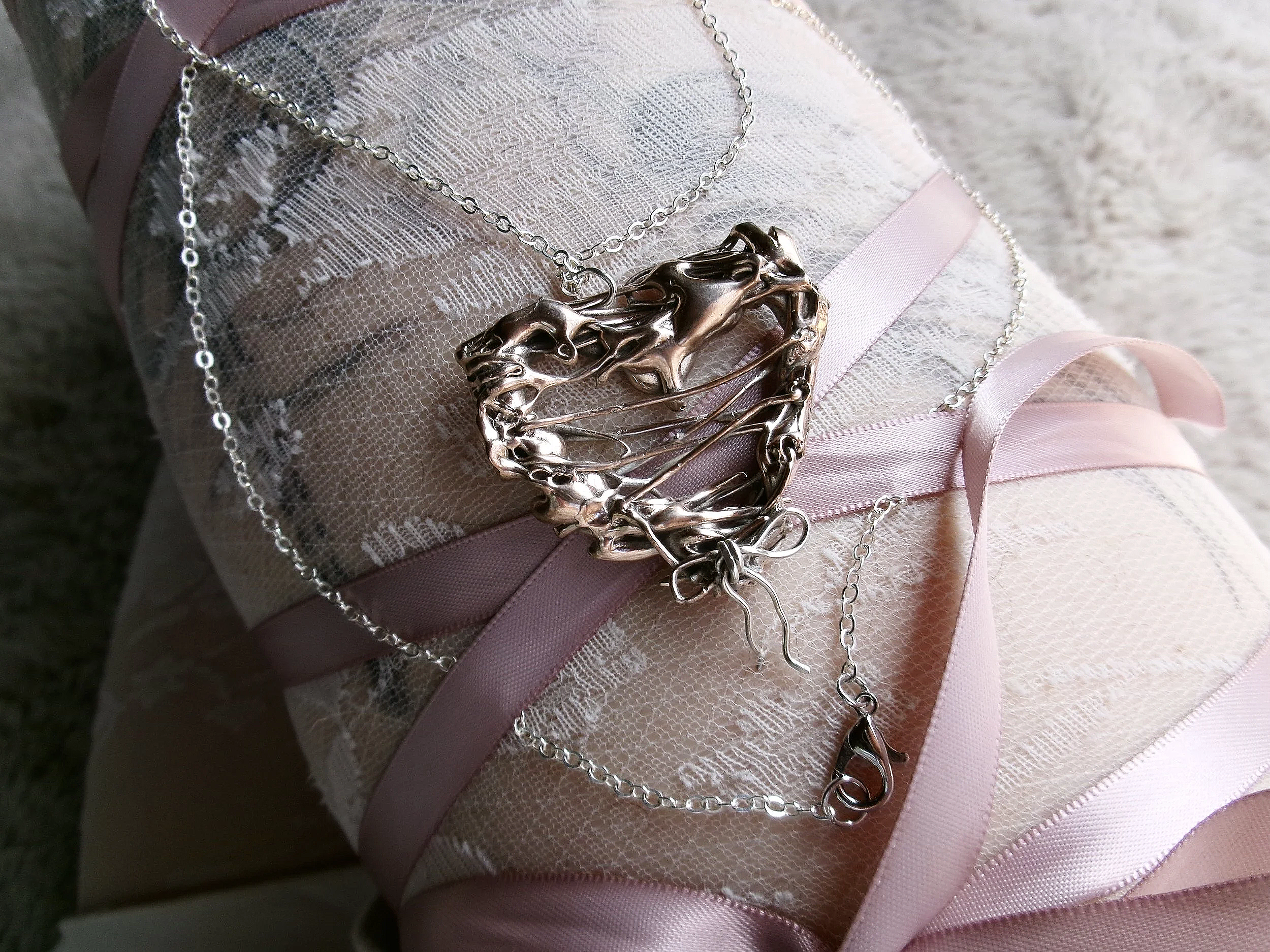 ' slimy heart necklace ' shibuichi silver, sterling silver. 2026.