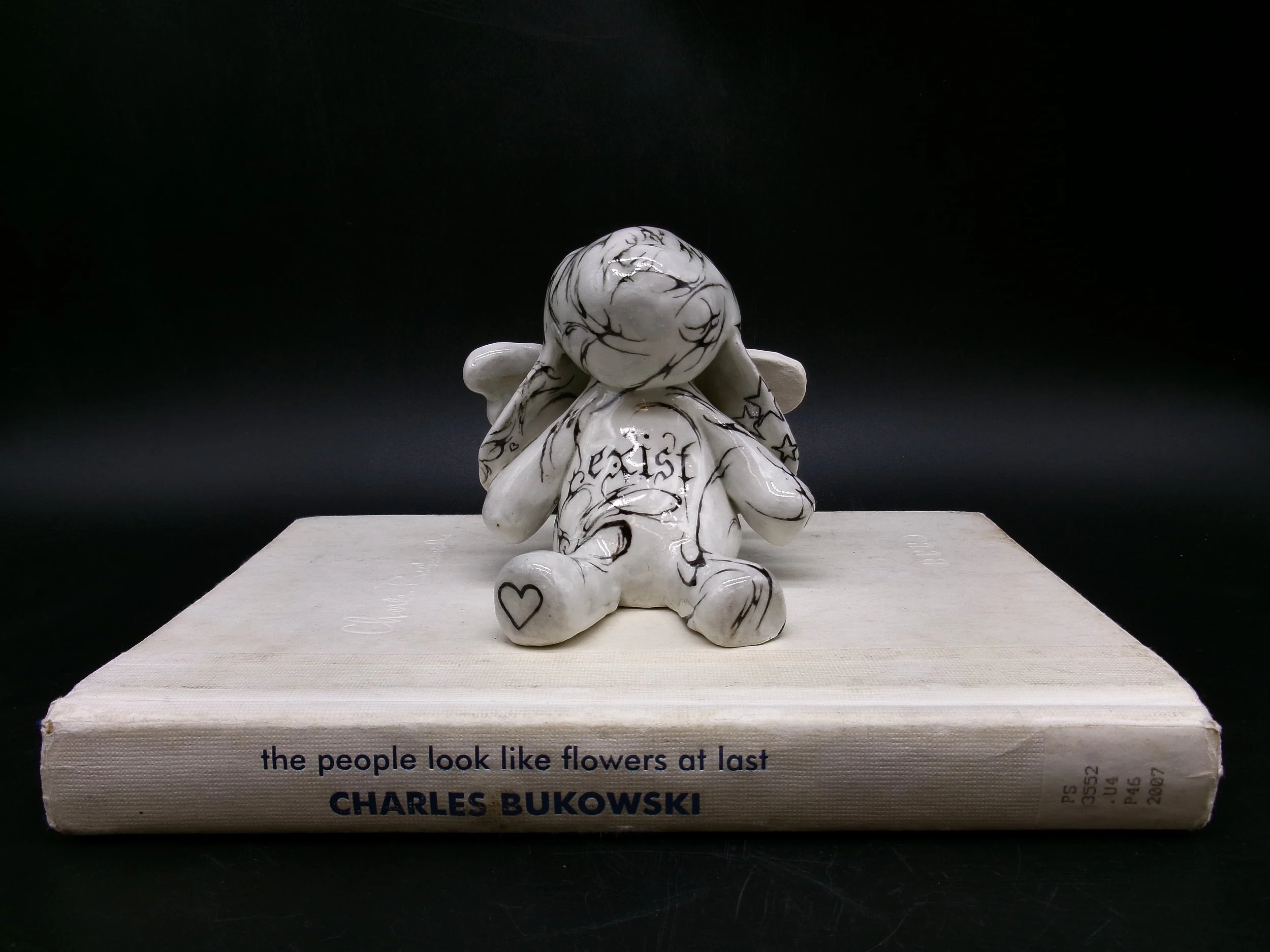 'exist , decay ' 2025. ceramic bunny angel 