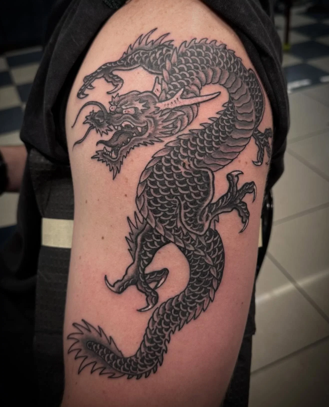 Dragon done by @jacobyoungtattoo at #ElmStreetTattoo #DallasTexas #DeepEllum⁠
⁠
Contact: https://www.jacobyoungtattoo.com/book or DM⁠
⁠
DM with questions or LINK IN BIO FOR APPOINTMENTS.⁠
⁠
#traditionaltattoo #americantraditional #tattooart #dragonta