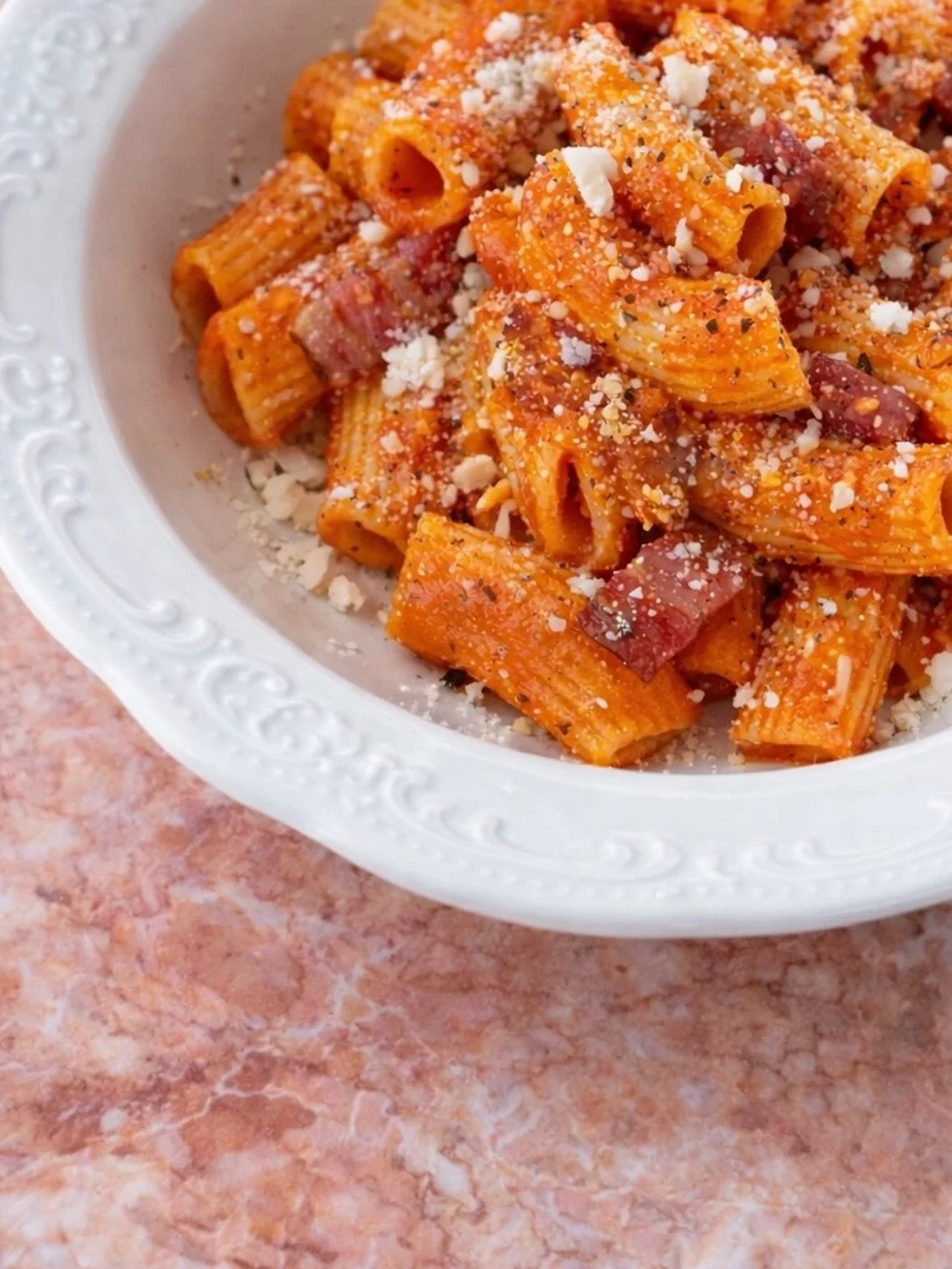 Today is the *first-ever* International Amatriciana Day.

A Roman classic built on just a few ingredients:
guanciale, tomato, pecorino, chili pepper.

Few ingredients. Big attitude.

No fuss. No extras. Just the good stuff.

We&rsquo;re celebrating a