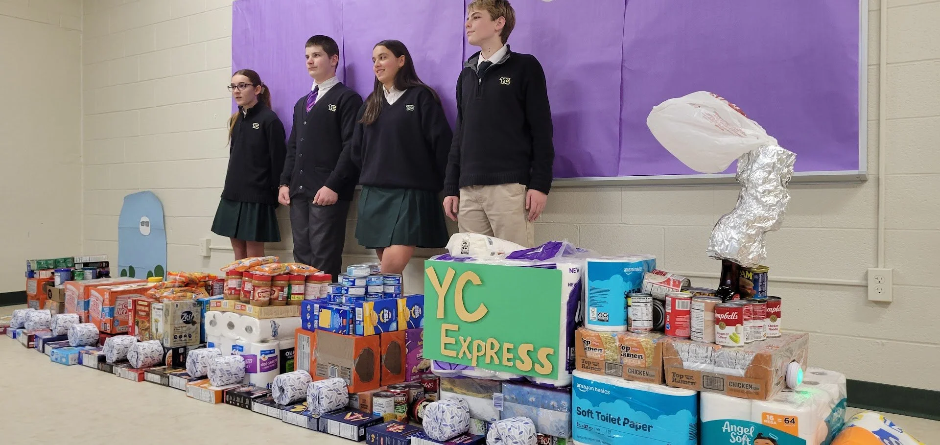 York Catholic Middle School in York, PA built a train with 1100 donated food items for Food Fight!