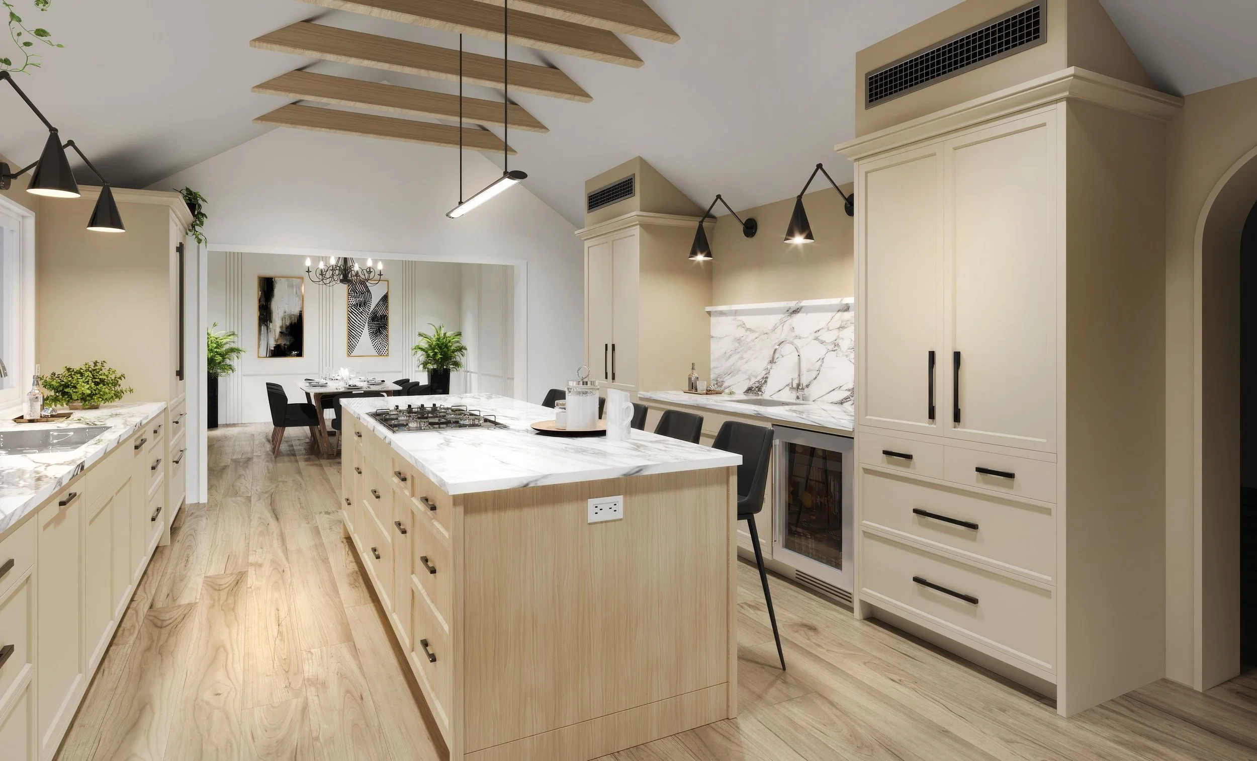 Modern kitchen with white cabinetry, marble countertops, and a large kitchen island with seating. There are built-in appliances, green plants, and pendant lighting, with a dining area visible in the background.