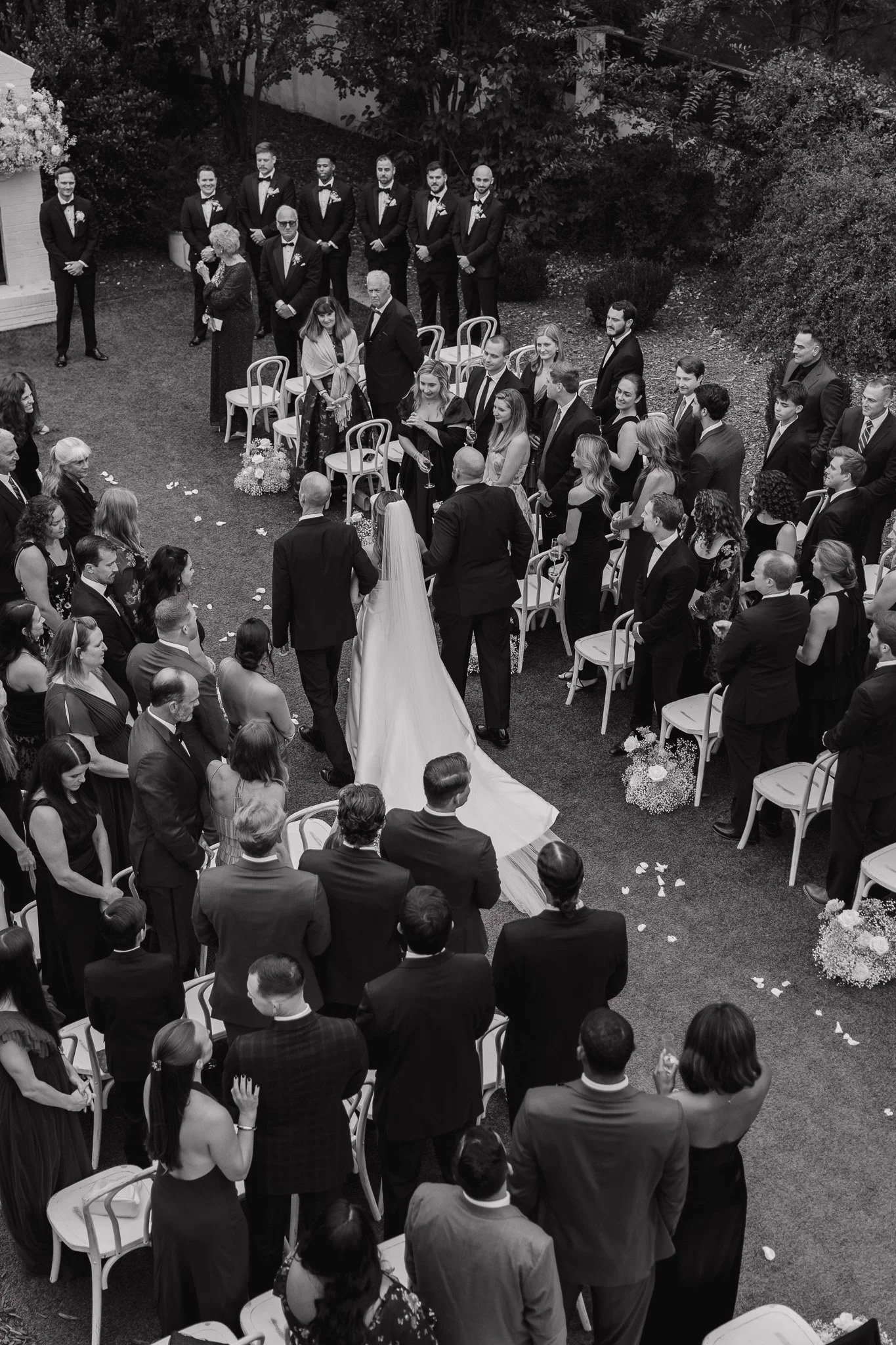  Bride walking down the aisle during outdoor October wedding at The Bradford, Raleigh 