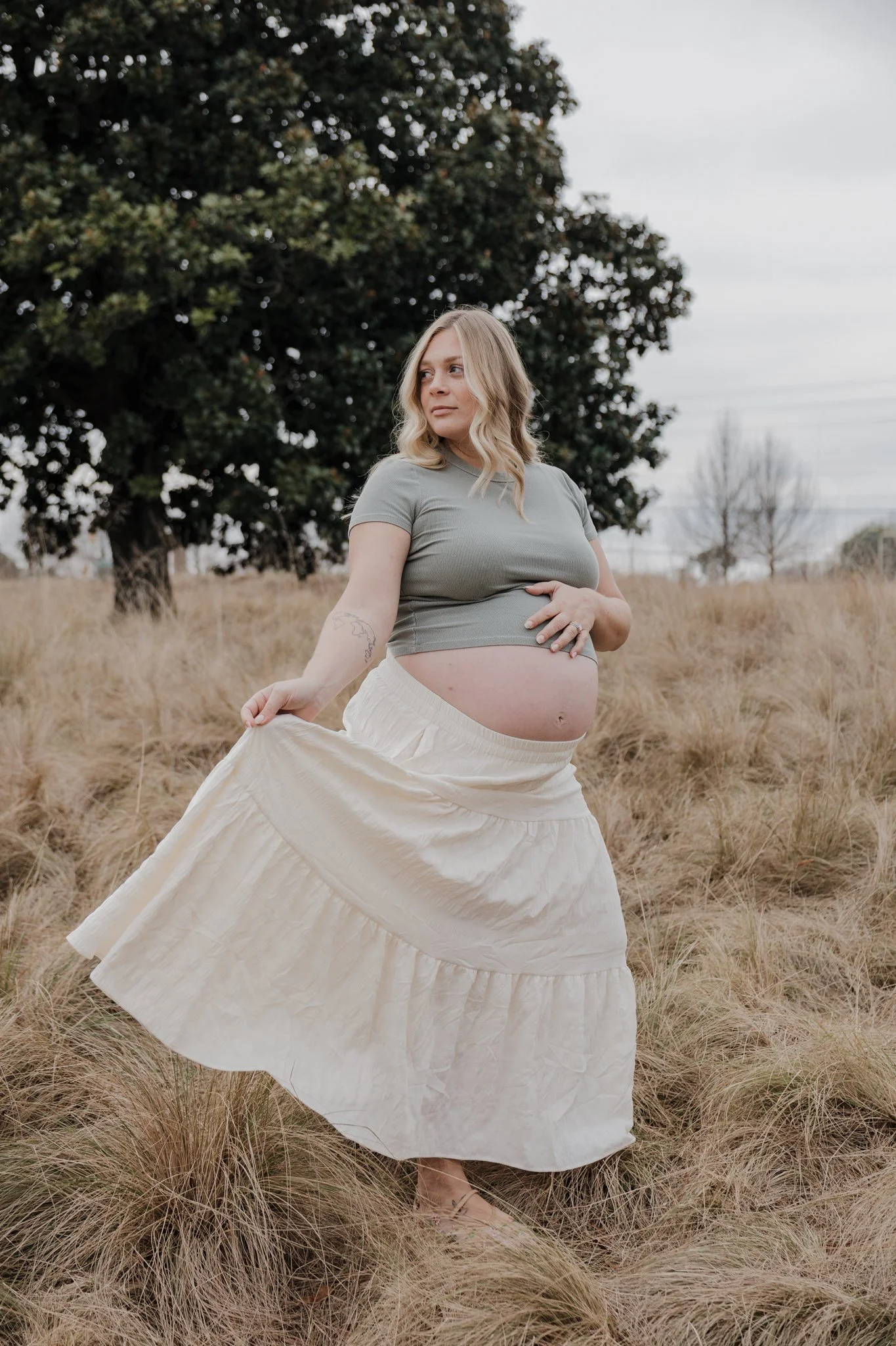  Raleigh maternity photography session at NCMA Park capturing the calm, emotional beauty of a second pregnancy. 