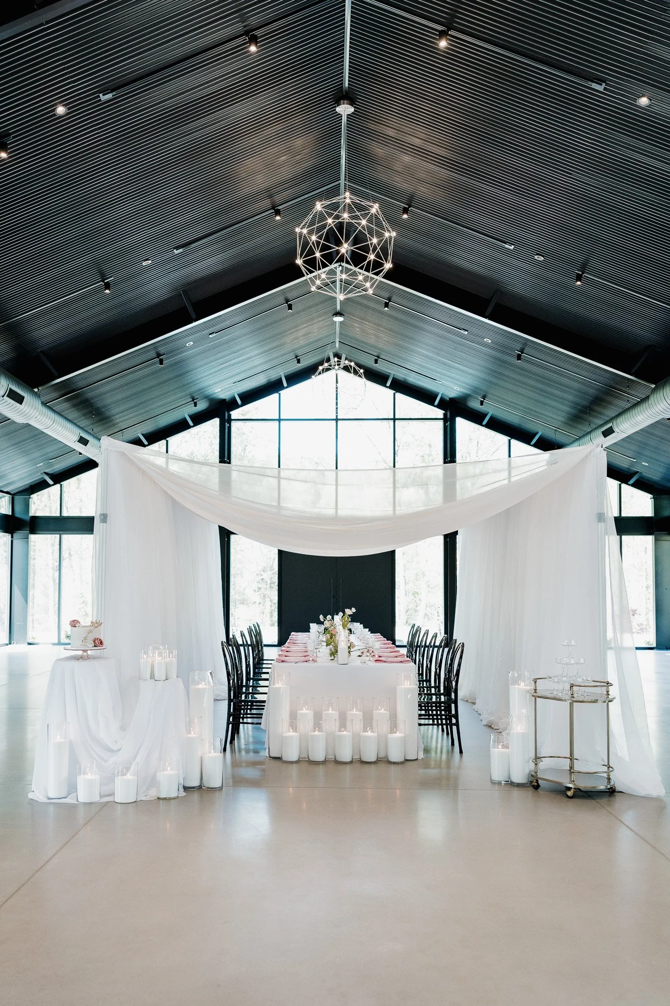 Reception dinner space decorated for wedding at The Skyroom Wedding Venue