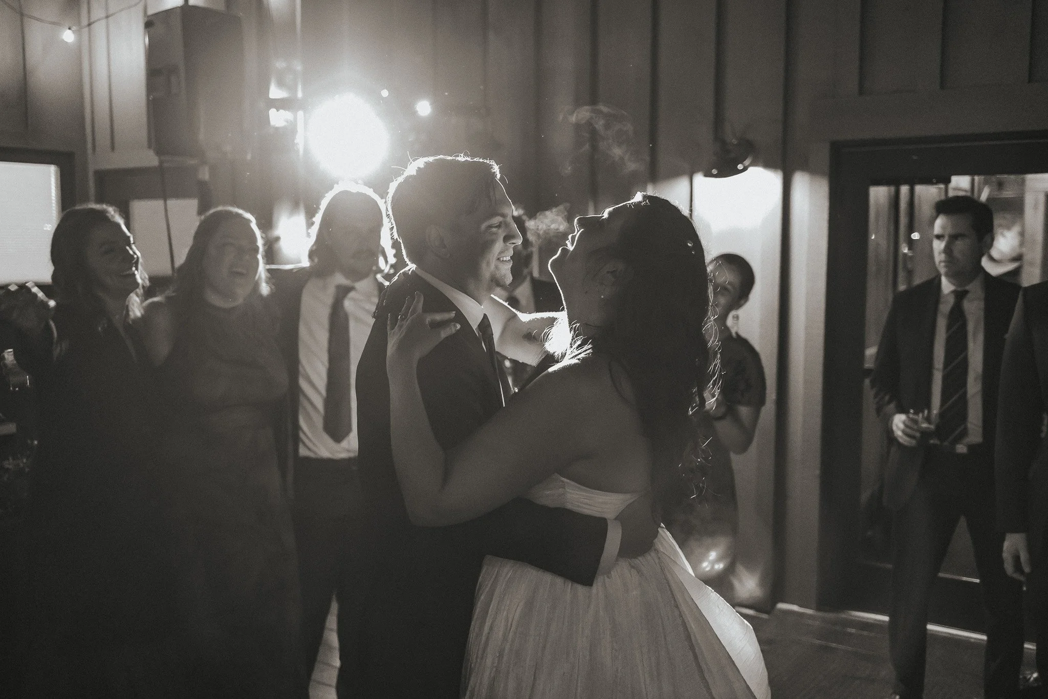 Carey and Zach share a romantic first dance at their wedding reception, set against the elegant backdrop of The Rigmor House.