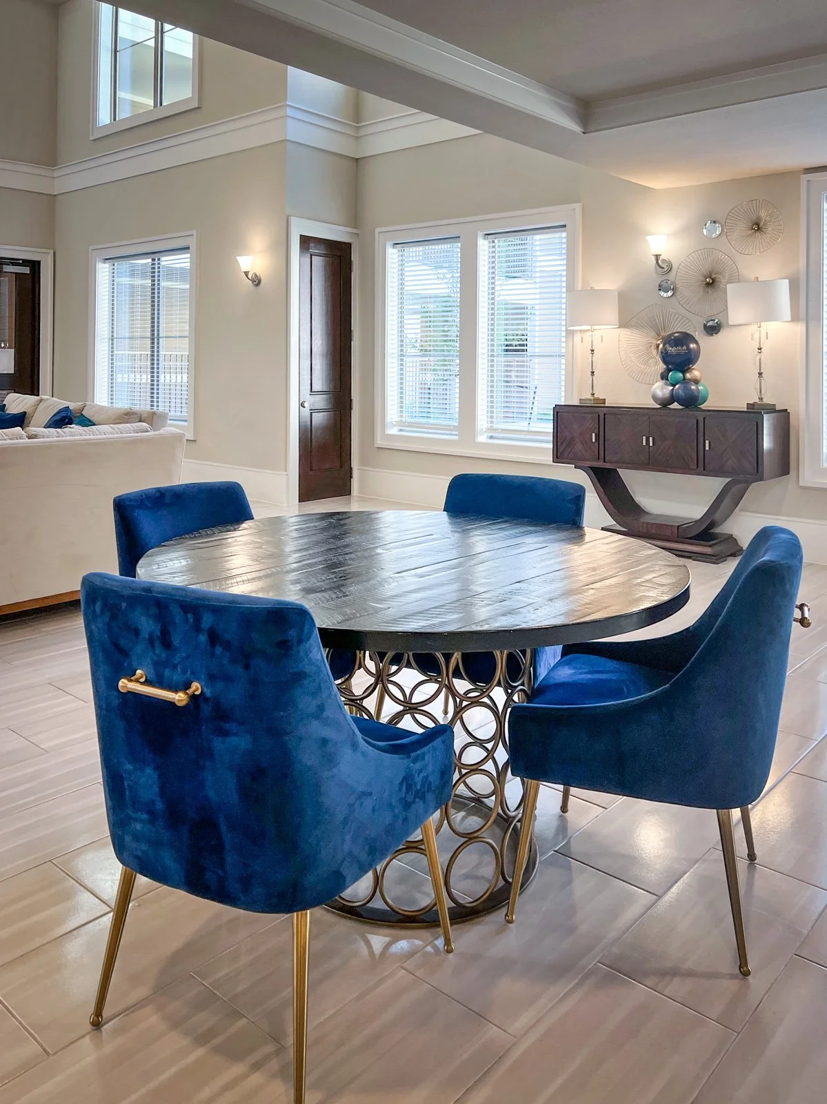 White walls and furniture in blue with transitional accessories for this active senior living community.