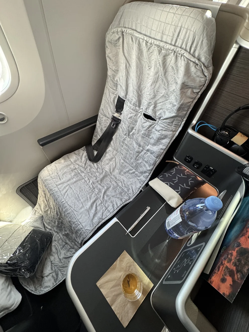  The seat comes with a light duvet which you fit yourself, and can do as soon as you board if you like. Blanket and small pillow are also provided.   