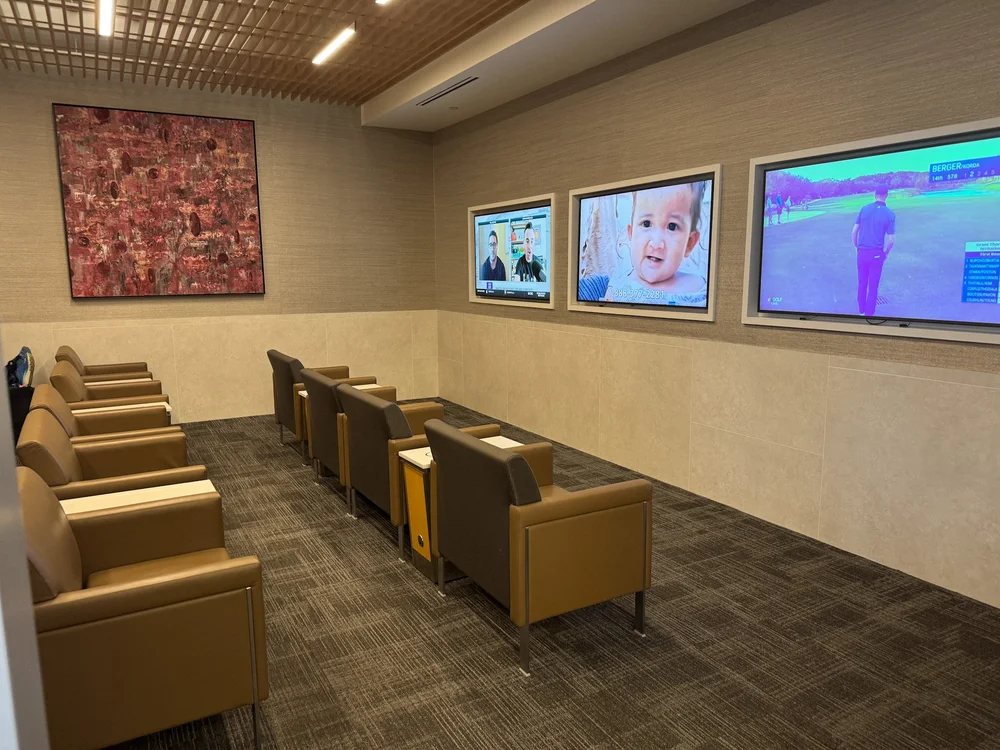   TV room with comfortable seating away from the crowds.  