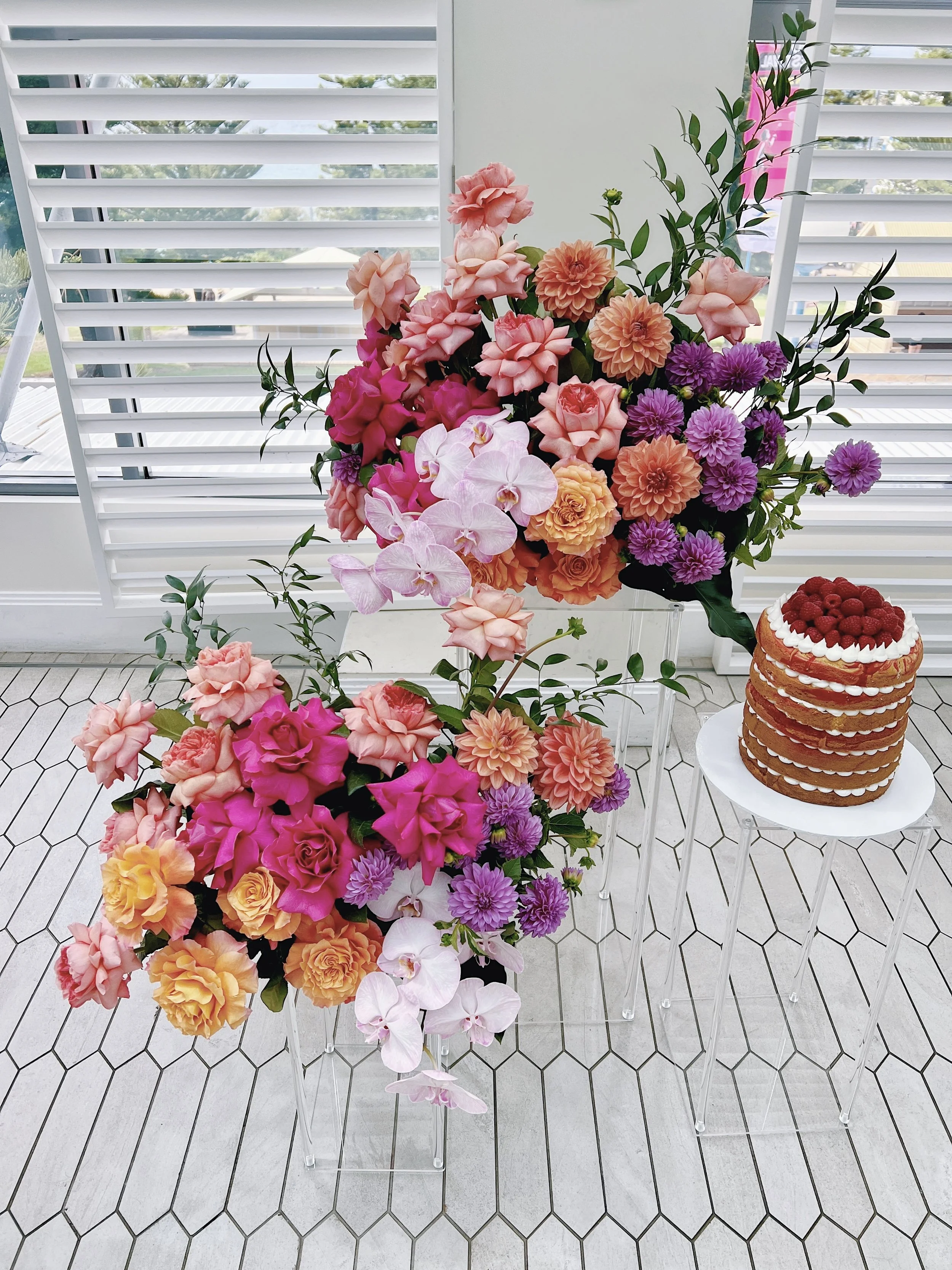 Elegant floral arrangement from Fleur De Lis Floristry, evoking the moody artistry of late night television