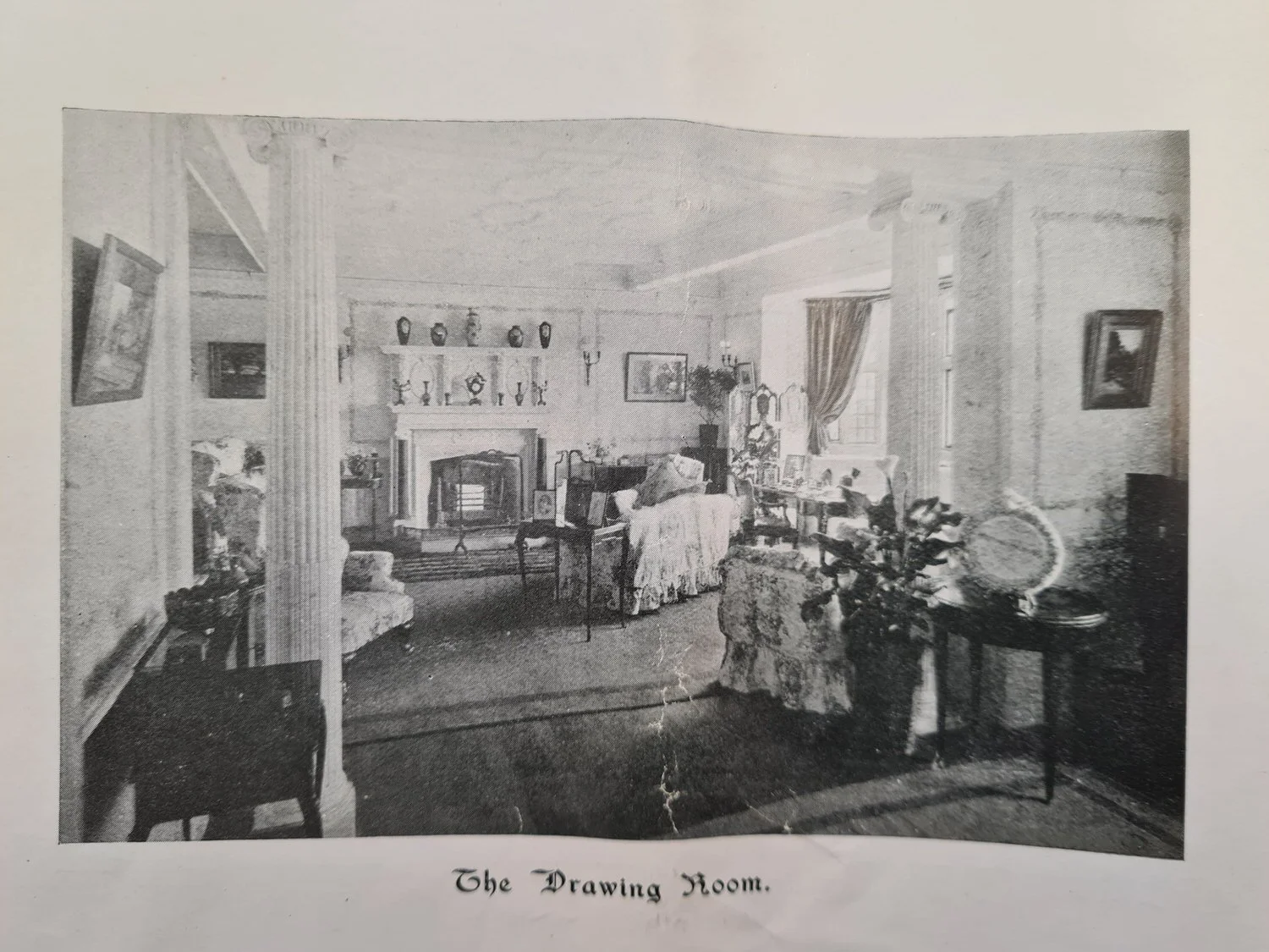 Historic image of the Drawing Room at Lanwades Hall featuring early 20th-century décor and architectural detailing.