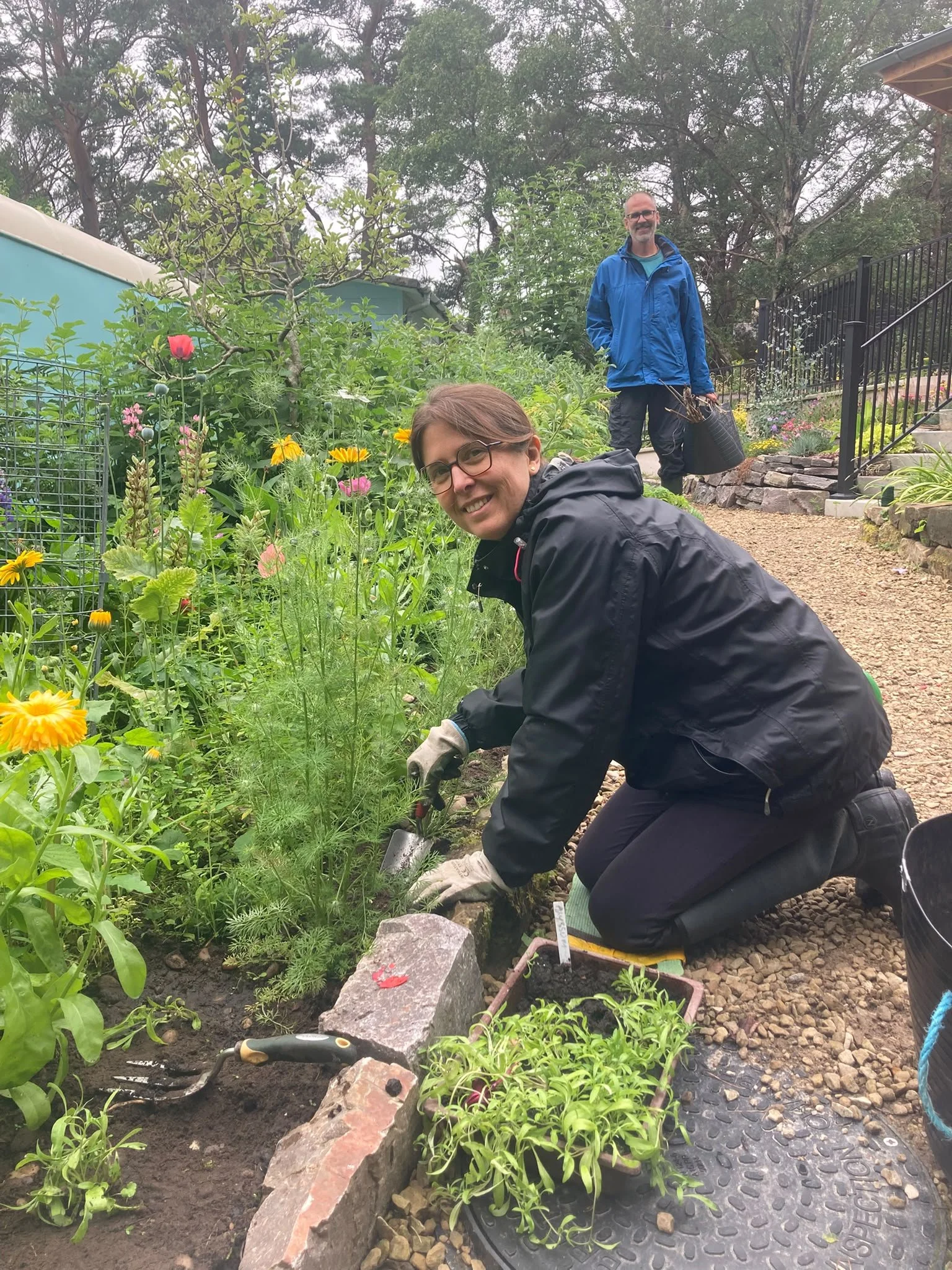 Garden Week Original Garden Martha Octavio weeding.jpeg