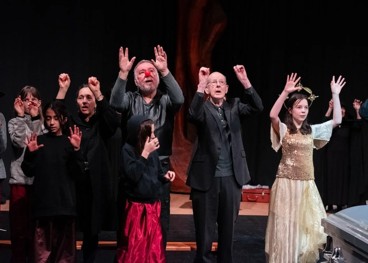 Theatre cast on stage
