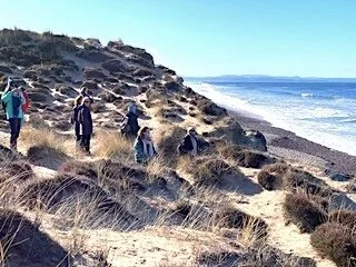 Women in dunes at Findhorn beach