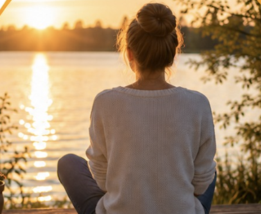 Woman watching sunset