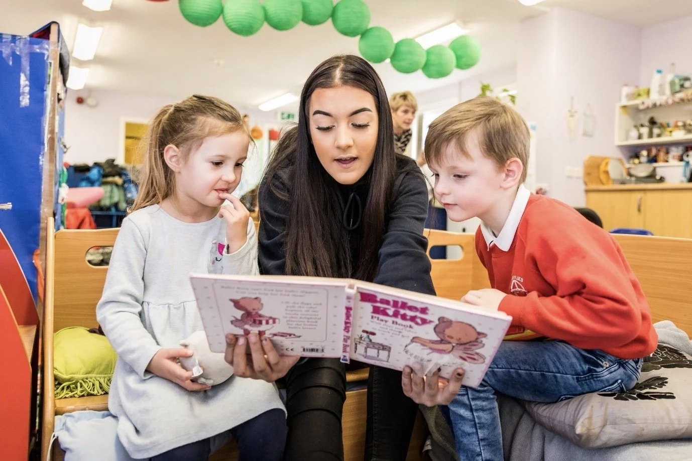 Children reading a book