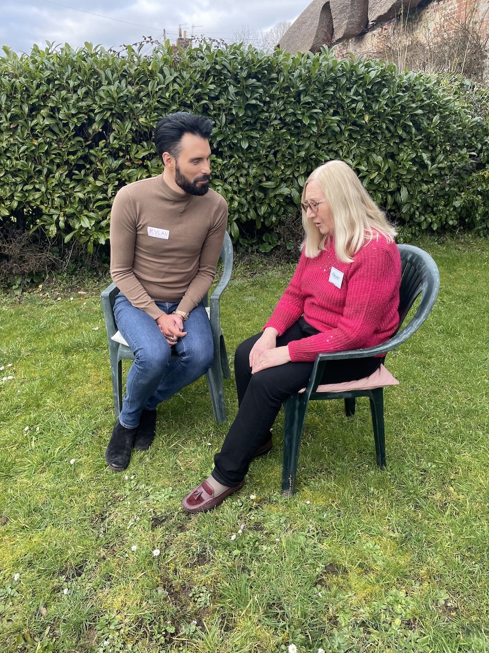 Rylan chats with Margaret in the garden