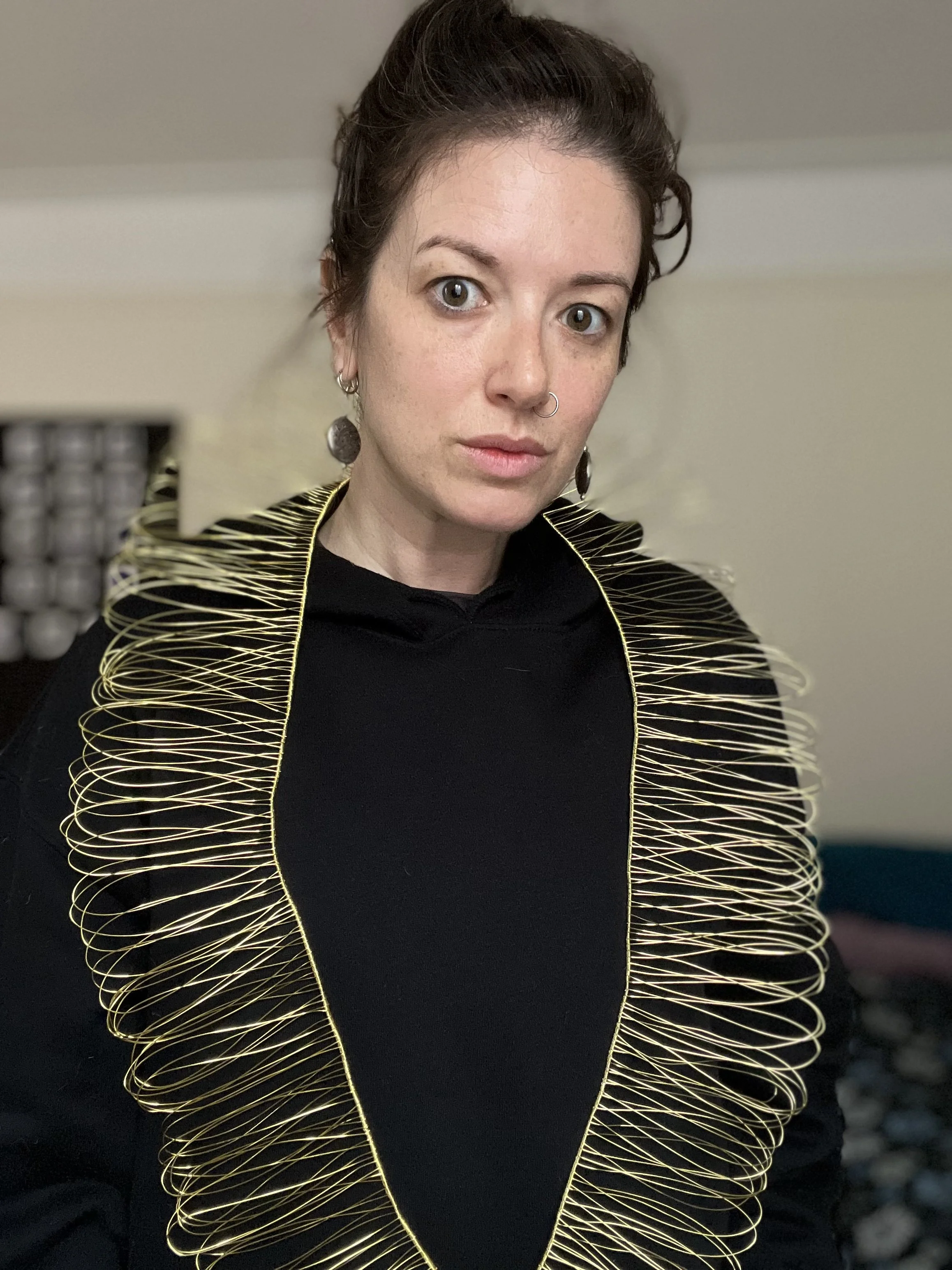 Gold Aura; 2024, aluminum wire, clasp