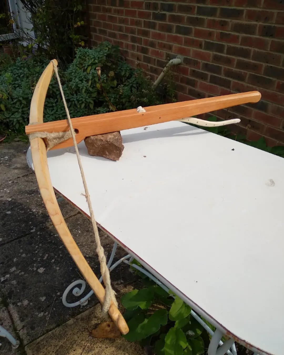 A 160lbs mid 12th century crossbow. The trigger is a copy of an archaeological find from Braunschweig. The dimensions of the lath are loosely based on those of the Berkhamsted bow, a find dated to the early 13th century.
The stock design is based on