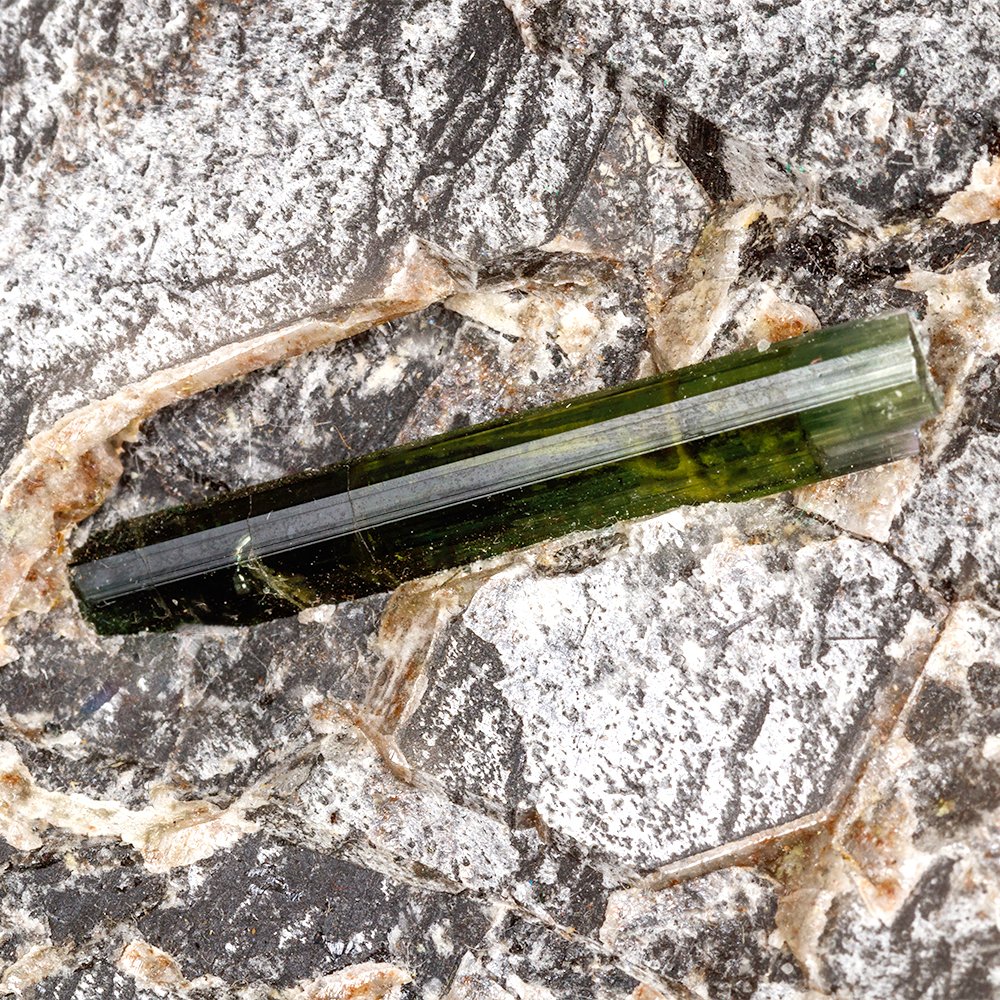 Green tourmaline in host rock