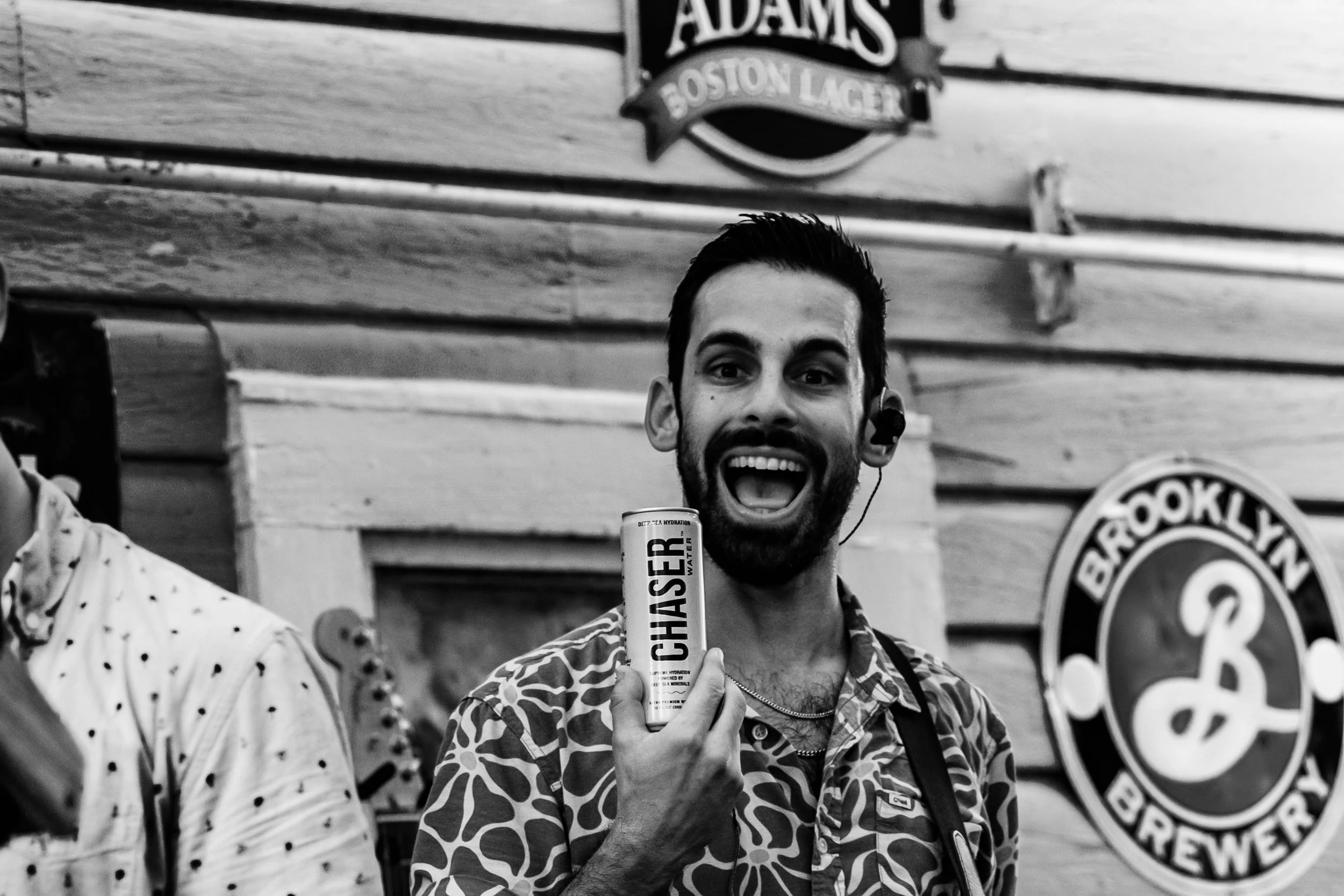 Local musician Joey Calderaio (seen pictured) hired me to shoot a performance of his. Chaser Water is a sponsor of his band and he asked me to grab some photos of the product.