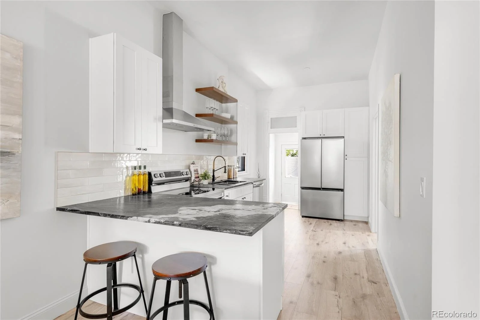 Contemporary Kitchen Remodel by JROC Colorado Construction project photo