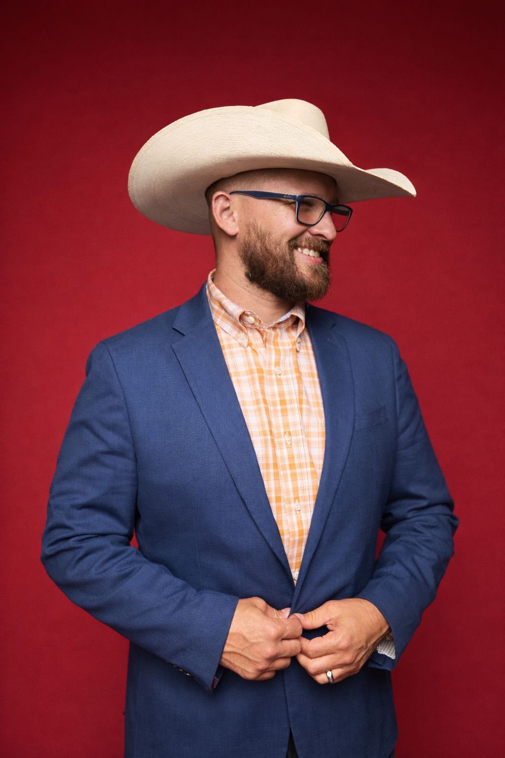 Rocco in a suit and his signature cowboy hat